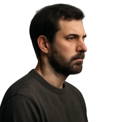 A MAN WITH SERIOUS EXPRESSION NOT TO BRIGHT LIGHTNING SIDE PROFILE IN CASUAL CLOTHES